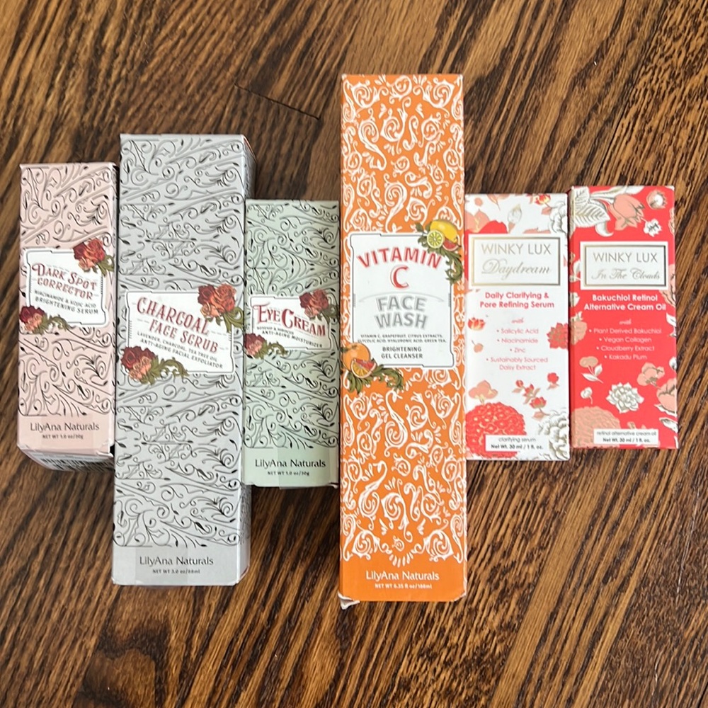 Assorted LilyAna and Winky Lux Natural Beauty Products.